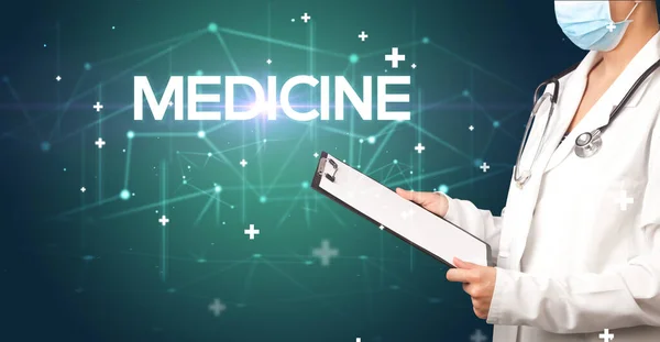 Doctor fills out medical record with MEDICINE inscription, medical concept
