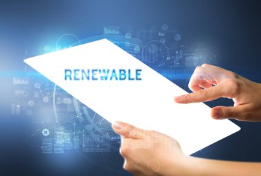 El işi fütüristik tablet. Yenilenebilir yazıtlar, yeni teknoloji kavramı.