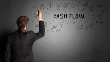CASH FLOW yazıtları ve iş stratejisi konseptiyle yaratıcı bir fikir çizimi yapan işadamı.