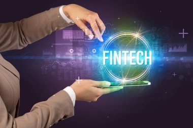 FINTECH yazıtları ve yeni teknoloji konseptiyle dokunmatik ekranın yakın plan görüntüsü