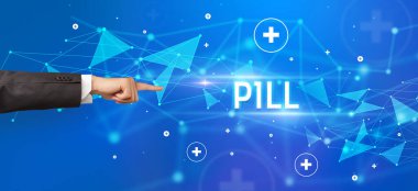 Kesilmiş ellerin yakın çekimi PILL yazısını işaret ediyor, tıbbi konsept