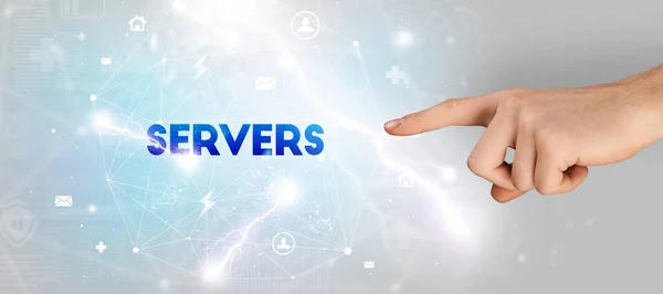 stock image Hand pointing at SERVERS inscription, modern technology concept