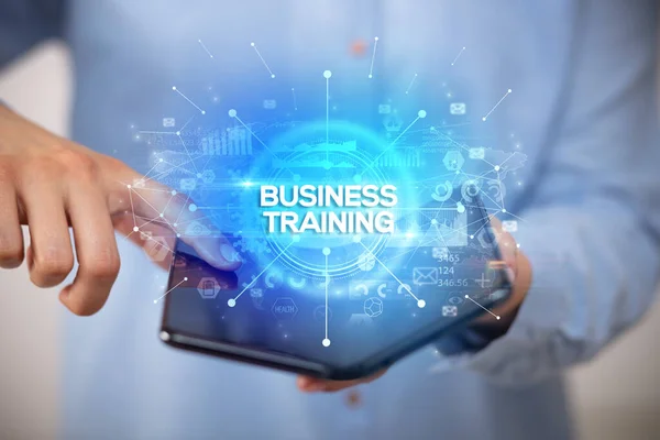 Businessman Holding Foldable Smartphone Business Training Inscription New Business Concept — Stock Photo, Image