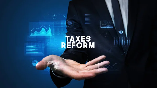 Hand Businessman Holding Taxes Reform Inscription Business Success Concept — Stock fotografie