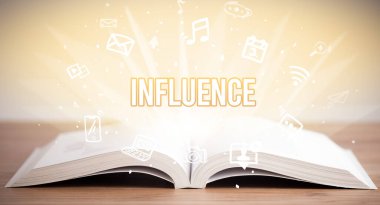 INFLUENCE yazıtlı bir kitap, iş konsepti