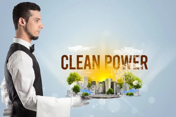 Waiter serving eco city with CLEAN POWER inscription, renewabke energy concept