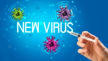 Şırınga, elinde yeni VIRUS yazısıyla tıbbi enjeksiyon, koronavirüs aşısı konsepti.