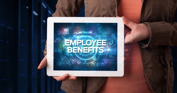 Young Business Person Werkt Tablet Toont Inscriptie Employee Benefits Business — Stockfoto