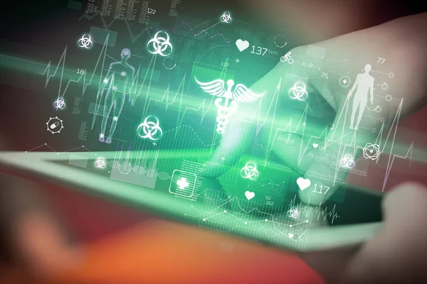 Close-up of a touchscreen with pharmacy icons, modern healthcare concept