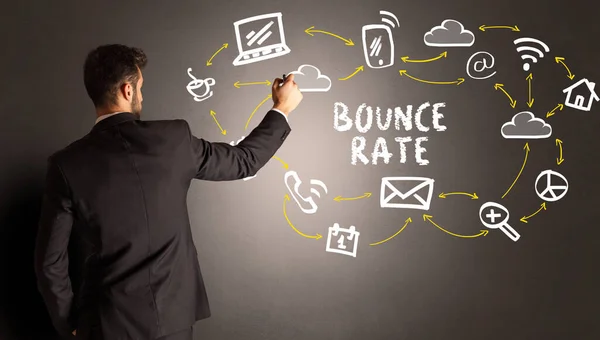 stock image businessman drawing social media icons with BOUNCE RATE inscription, new media concept