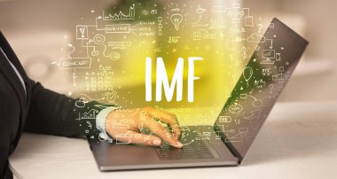 el, IMF kısaltması modern teknoloji kavramı ile yeni modern bilgisayar üzerinde çalışıyor