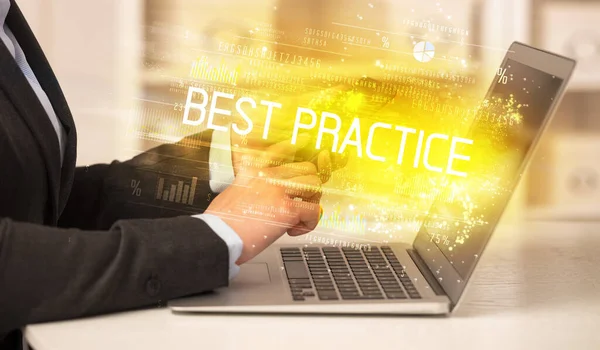 stock image Closeup of businessman hands working on laptop with BEST PRACTICE inscription, succesfull business concept