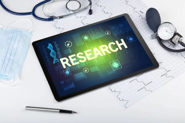 ReSEARCH yazıtları ve önleme kavramı içeren tablet bilgisayar ve tıbbi malzemeler