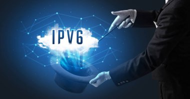 Sihirbaz IPV6 kısaltması olan modern teknoloji konseptiyle sihirbazlık numarası yapıyor.