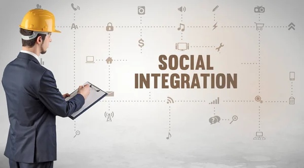 Engineer working on a new social media platform with SOCIAL INTEGRATION inscription concept