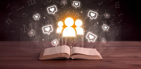 Open book with people icons above, social networking concept