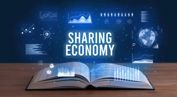 SHARING ECONOMY inscription coming out from an open book, creative business concept