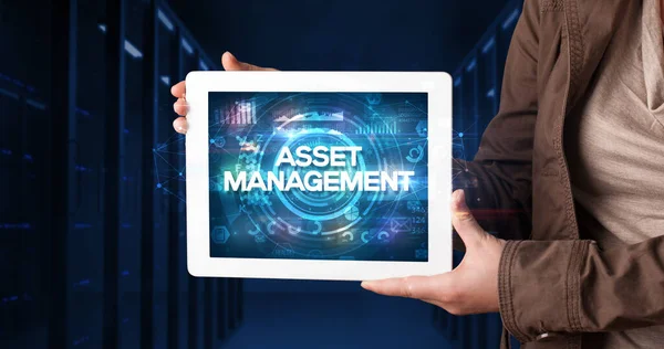 Young Business Person Working Tablet Shows Inscription Asset Management Business — Stock Photo, Image