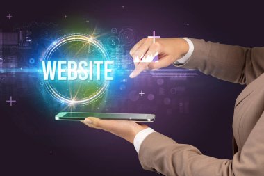 WEBSITE yazıtlı bir dokunmatik ekran, yeni teknoloji konsepti