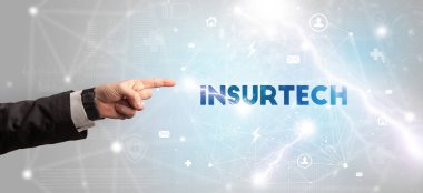 INSURTECH yazıtlarına el işareti, modern teknoloji kavramı