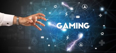 GAMING yazıtlarına el işareti, modern teknoloji kavramı