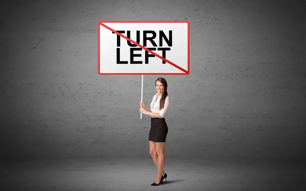 Бізнесмен Який Тримає Дорожній Знак Написом Turn Left Нова Концепція — стокове фото