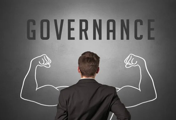 Achteraanzicht Van Een Zakenman Met Governance Inscriptie Krachtig Business Concept — Stockfoto