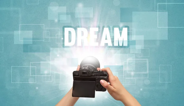 Close Hand Holding Digital Camera Dream Inscription Traveling Concept — Stock Photo, Image