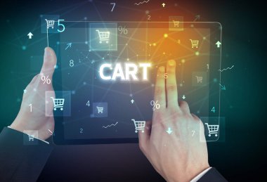 CART yazıtlı, çevrimiçi alışveriş konsepti olan bir el tutma tabletinin yakın çekimi
