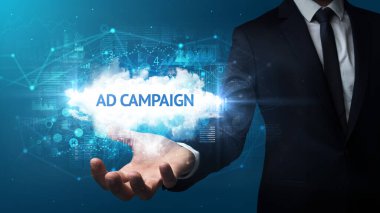 AD CAMPAIGN yazıtlarını tutan İşadamı 'nın eli, başarılı iş kavramı