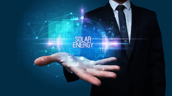 Man Hand Holding Solar Energy Inscription Technology Concept — 스톡 사진