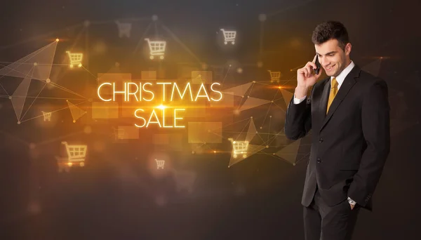 Obchodník Ikonami Nákupního Košíku Nápisem Christmas Prodej Koncept Nakupování Online — Stock fotografie