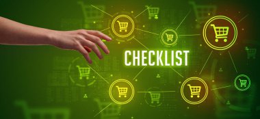 ChECKLIST yazıtına işaret eden kırpılmış elin yakın çekimi, çevrimiçi alışveriş kavramı