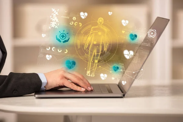 Doctor Working Laptop Powerful Healthcare Icons Coming Out Healthcare Concept — Stock Photo, Image