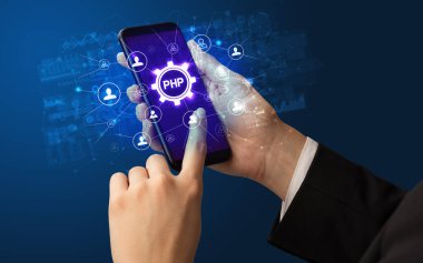 PHP kısaltmalı akıllı telefon, modern teknoloji konsepti.