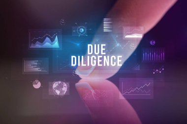 Tablete çizelgeler ve DUE DILIGENCE yazıtları ile dokunmak, iş konsepti