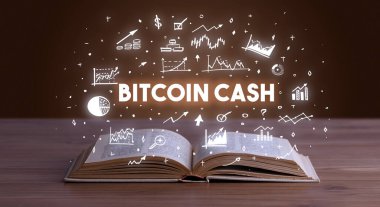 Açık bir kitaptan çıkan Bitcoin Cash yazıtlamı, iş konsepti