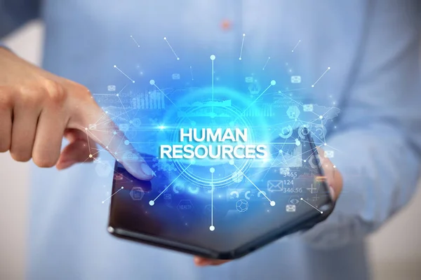 Biznesmen Posiadający Składany Smartfon Napisem Human Resources Nowa Koncepcja Biznesowa — Zdjęcie stockowe