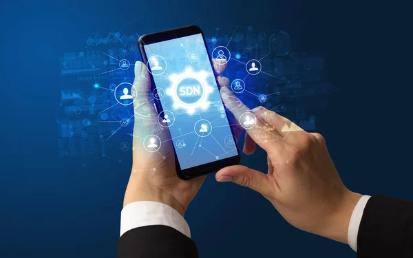 Vrouwelijke Handheld Smartphone Met Sdn Afkorting Modern Technologie Concept — Stockfoto