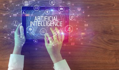 ARTIFICIAL INTELLIGENCE yazıtlı, yenilikçi teknoloji kavramına sahip bir tabletin yakın çekimi