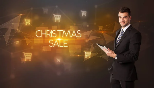 Obchodník Ikonami Nákupního Košíku Nápisem Christmas Prodej Koncept Nakupování Online — Stock fotografie