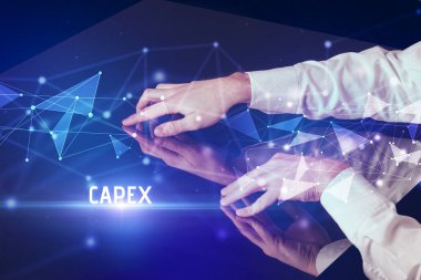 İş adamı CAPEX yazısıyla büyük ekrana dokunuyor, modern teknoloji iş konsepti
