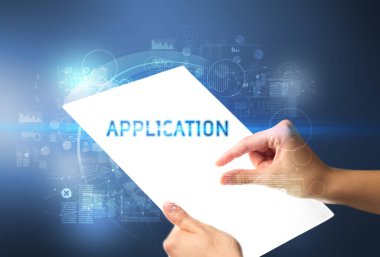 APPLICATION yazıtlı el yapımı fütüristik tablet, yeni teknoloji kavramı