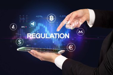 Bir dokunmatik ekran yakın çekim REGULATION yazıt, iş fırsatı konsepti