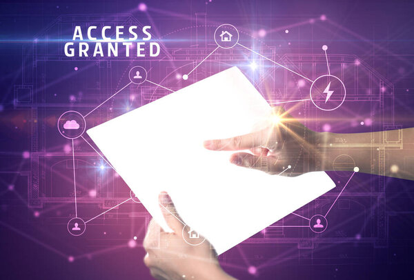 Проведение футуристического планшета с надписью ACCESS GRANTED, концепция кибербезопасности