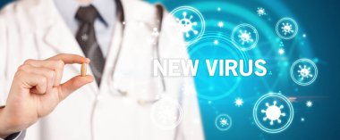 Yeni VIRUS yazıtlı, koronavirüs konseptli ilaç veren doktor.