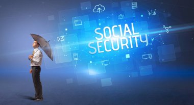 Siber saldırı ve SOSYAL Güvenlik yazıtlarına karşı şemsiyeyle savunma yapan iş adamı, çevrimiçi güvenlik kavramı