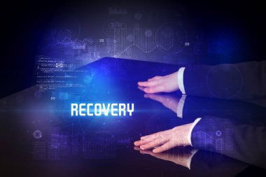 Elle dokunulan dijital tablo RECOVERY yazıtları, yeni çağ güvenlik kavramı