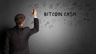 İş adamı Bitcoin Cash yazıtları ve iş stratejisi konseptiyle yaratıcı bir fikir taslağı çiziyor.