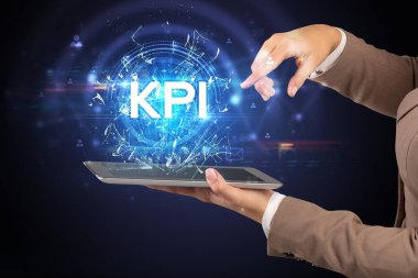 KPI kısaltması olan dokunmatik ekrana yakın çekim, modern teknoloji kavramı